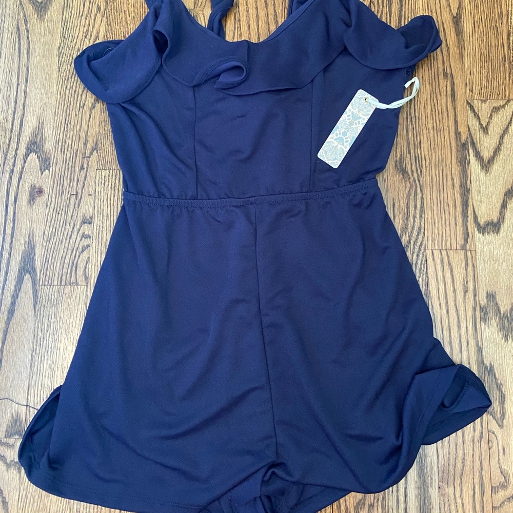 Ruffled tie back romper